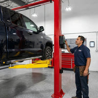 Two Post Car Lift Built to Handle 12000 lbs, Extra Height Design, Dual Hydraulic Chain Drive, 70 Inch Lift — Lifestyle